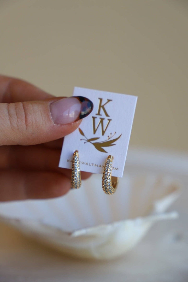 E1679 Gold Earrings-Oval CZ Huggie Hoops