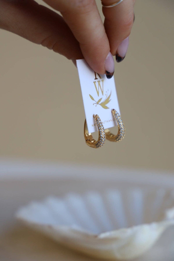 E1679 Gold Earrings-Oval CZ Huggie Hoops