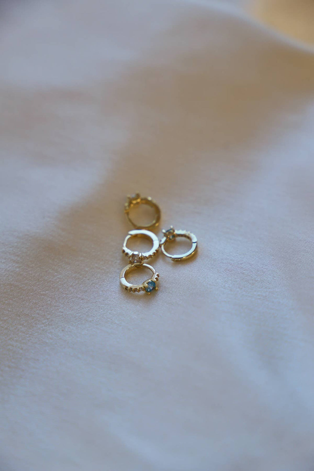 E1606AQUA Gold Earrings-Shine On Mini CZ Hoops Aqua
