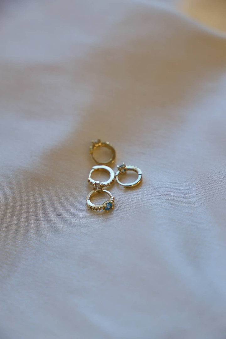 E1606AQUA Gold Earrings-Shine On Mini CZ Hoops Aqua